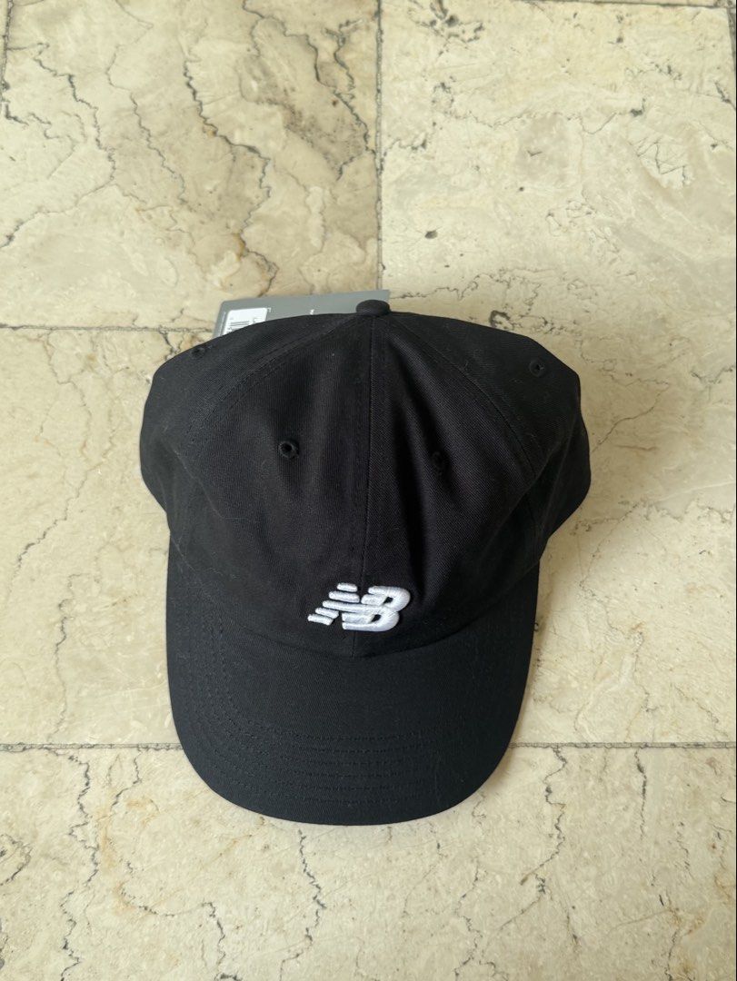 New Balance Black Baseball Cap Hat (Category: Caps & Hats) located in San Pedro. Submitted by moonllax (Listing ID 1469238461, Image 1). Description: - Brand: New Balance - Color: Classic Black with White Embroidered Logo - Condition: Brand New with Tags (BNWT) - Features: Adjustable strap with metallic buckle, branded inner taping - Style: Casual baseball cap / dad hat, perfect for everyday use -authentic🇺🇸🇺🇸🇺🇸.