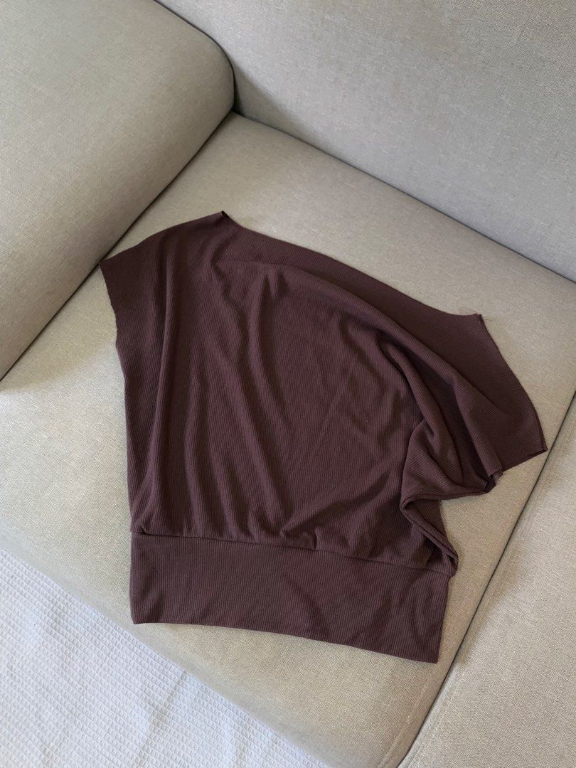 New Brown asymmetrical top (Category: Blouses) located in Paranaque City. Submitted by shoplovedbya (Listing ID 1469268403, Image 1). Description: ♡ Size: Medium- Large ♡ Bust: stretch up to 40 - New, never been worn .