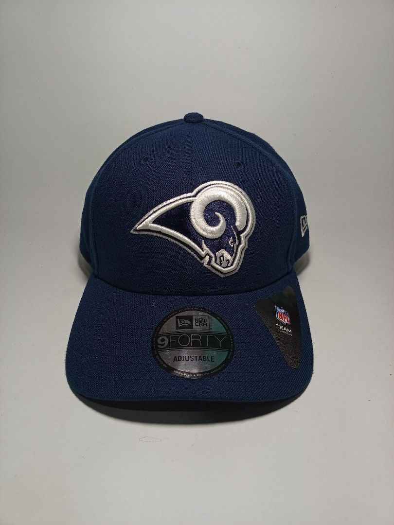 New Era Los Angeles Rams 9FORTY Adjustable Cap (Category: Caps & Hats) located in Lucena. Submitted by sanera_23 (Listing ID 1469348102, Image 1). Description: - Brand: New Era - Style: 9FORTY Adjustable Strapback (Hook and Loop Closure) - Team: Los Angeles Rams - Color: Navy Blue - Condition: Brand new with original store tag and NFL brim sticker - Size: One size fits most adults - Features: Structured crown and curved visor.