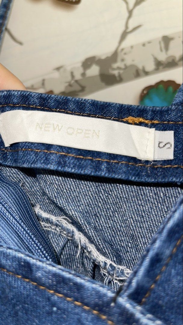 NEW OPEN Denim Dress Size S (Category: Dresses) located in Manila. Submitted by mightyfire-1f1603 (Listing ID 1469287423, Image 2). Description: - Brand: New Open - Size: Small - Material: Blue wash denim - Design: V-neck crossover front, double spaghetti straps, gathered waistline - Style: Cute, casual everyday piece - Pairing: Easy to style with sneakers or sandals.