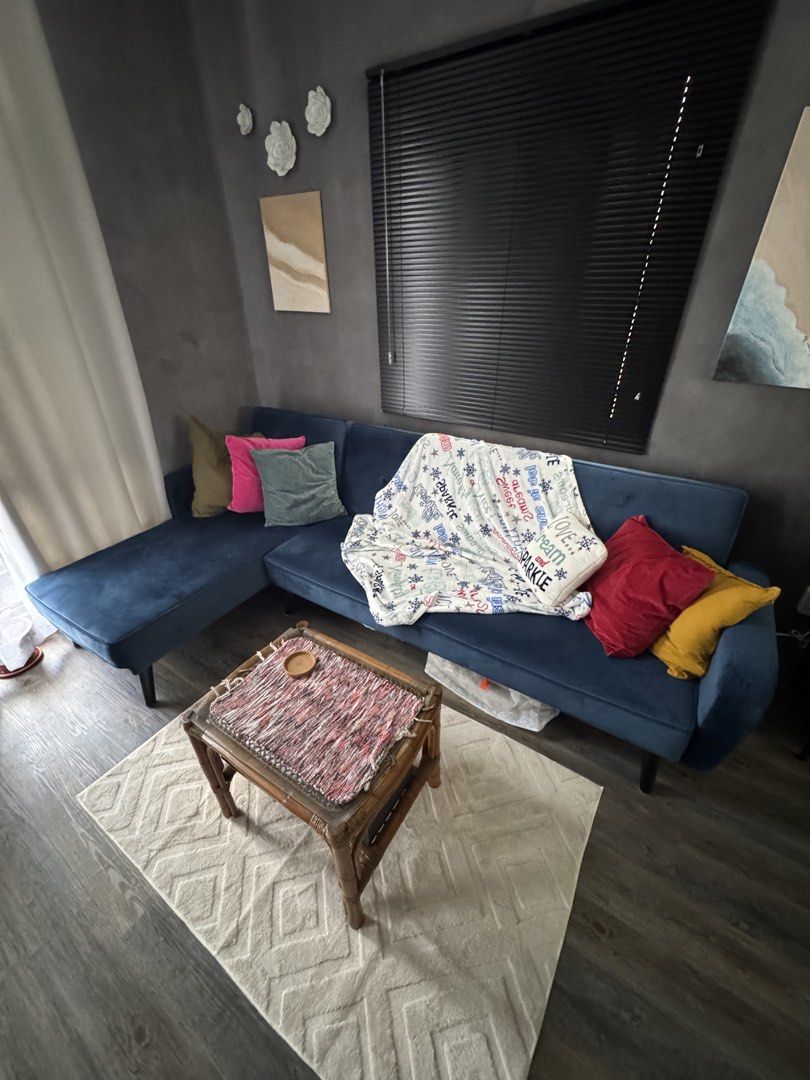 New Valentine 4-Seater Sofa Bed (Category: Sofas) located in Paranaque City. Submitted by mykindofclothing (Listing ID 1469187608, Image 2). Description: Homemaker Furniture New Valentine Velvet Sofa Bed in deep blue. Can accommodate 3-5 persons. Stylish, comfortable, and effortlessly converts into a Queen-sized bed with reclinable backrests. Dimensions: 274cm x 154cm x 85cm. Includes 2 pillows. Space-saving and perfect for any modern home. No fl