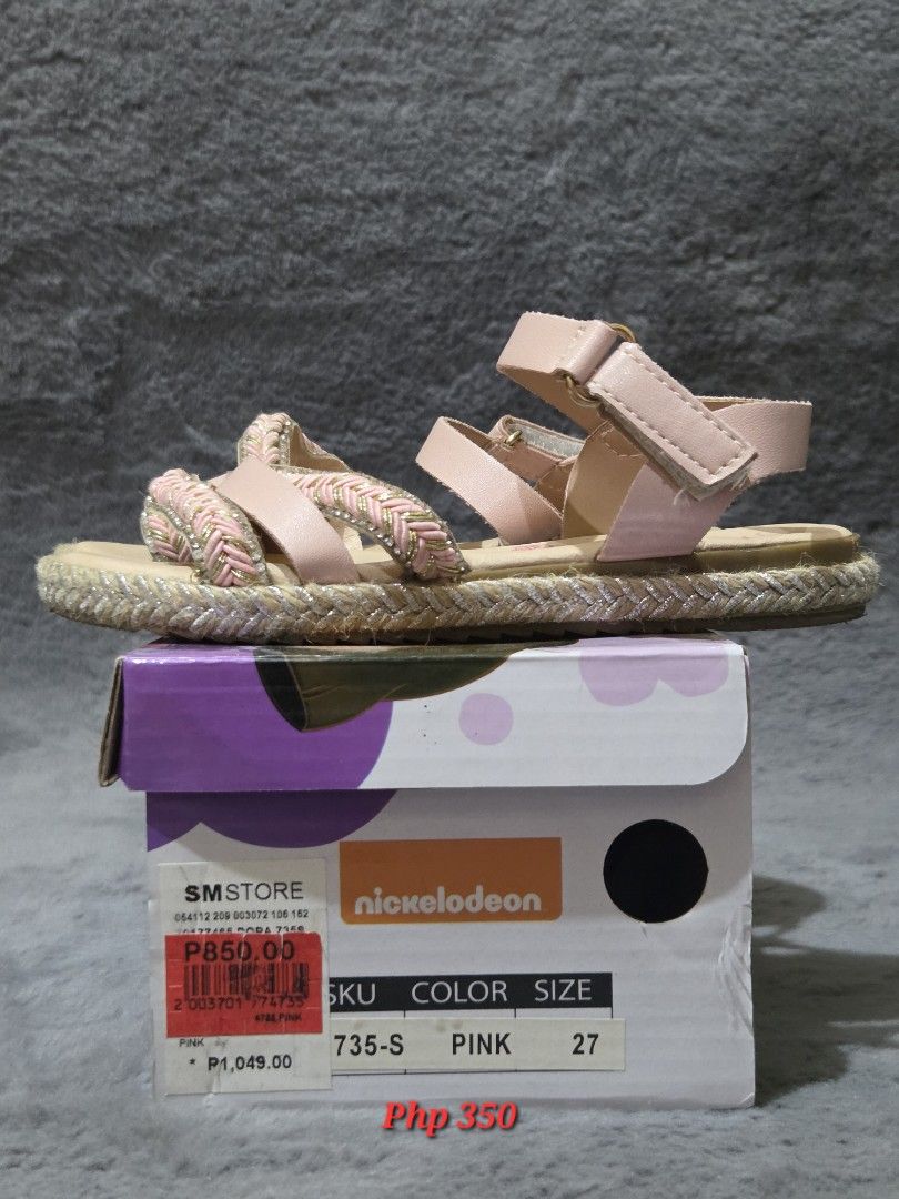 Nickelodeon Dora the Explorer Pink Sandals (Category: Babies & Kids Fashion) located in Bulacan. Submitted by gtrvddg (Listing ID 1469226201, Image 1). Description: - Brand: Nickelodeon Dora the Explorer - Color: Pink - Design: Braided strap details with ankle strap buckle closure - Soles: Flat soles with textured bottom grip for safety - Packaging: Includes original Nickelodeon branded box - Condition: Like new / Excellent quality.