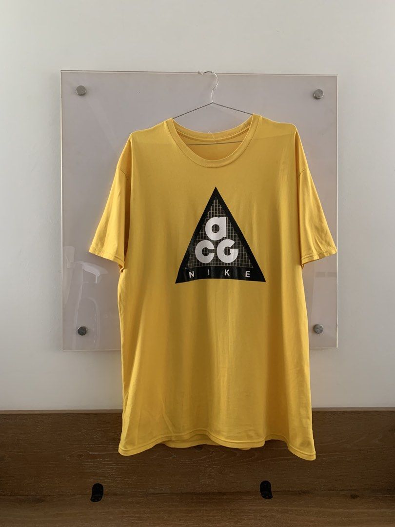 Nike ACG Yellow T-shirt (Category: Tshirts & Polo Shirts ) located in Pasig City. Submitted by greatestpickup (Listing ID 1469329172, Image 1). Description: - Brand: Nike ACG - Color: Bright Yellow - Size: XXLarge 25x33 1,400 only.