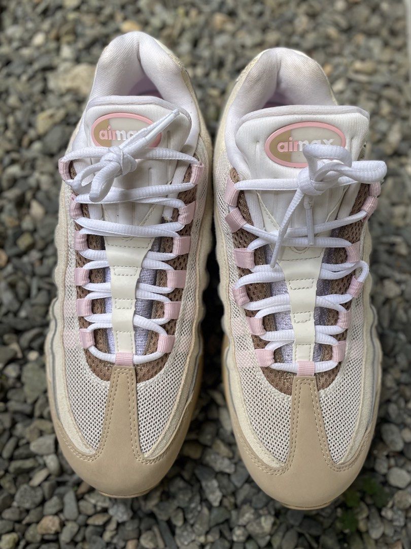 Nike Air Max 95 (Category: Sneakers) located in Baguio. Submitted by jomelcavit29012 (Listing ID 1469251153, Image 2). Description: Nike Air Max 95 - Condition : Brand new - Colorway: Desert Sand & Pink - Size: US 10 / UK 7.5 / EUR 42 - Size 10 Women’s 8.5 Men’s - Materials: Classic wavy panel design with mesh and suede uppers - Details: Visible Air units with pink cushioning, white laces, and padded ankle collars - Condition: Clean overall shape