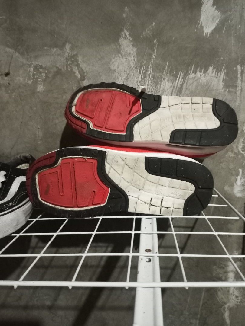 Nike Air Max Lunar1 White Red US 8 (Category: Sneakers) located in Mabalacat. Submitted by hasashoe (Listing ID 1469176279, Image 3). Description: - Model: Nike Air Max Lunar1 (Style Code: 654469-101) - Colorway: White and Red - Size: US 8, UK 7, EUR 41 (26 cm) - Design: White mesh upper with red mudguard, Swoosh branding, and visible Air unit - Condition: Soles show moderate wear from previous use - Style: Classic retro runner.