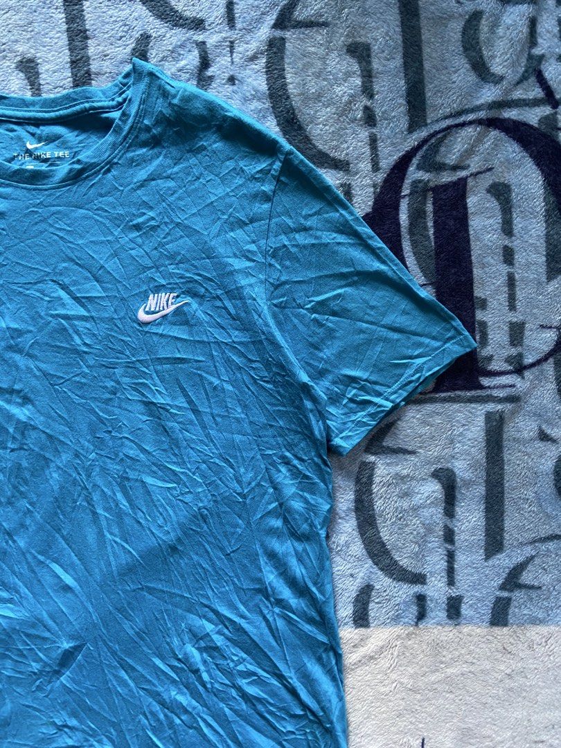 NIKE BASIC EMBROIDERED LOGO BLUE TSHIRT (Category: Tshirts & Polo Shirts ) located in Davao. Submitted by re.wornn (Listing ID 1469218109, Image 2). Description: •MEDIUM W17 L27 •EXCELLENT CONDITION 🏷️350 ADD SHIP 📩DM.