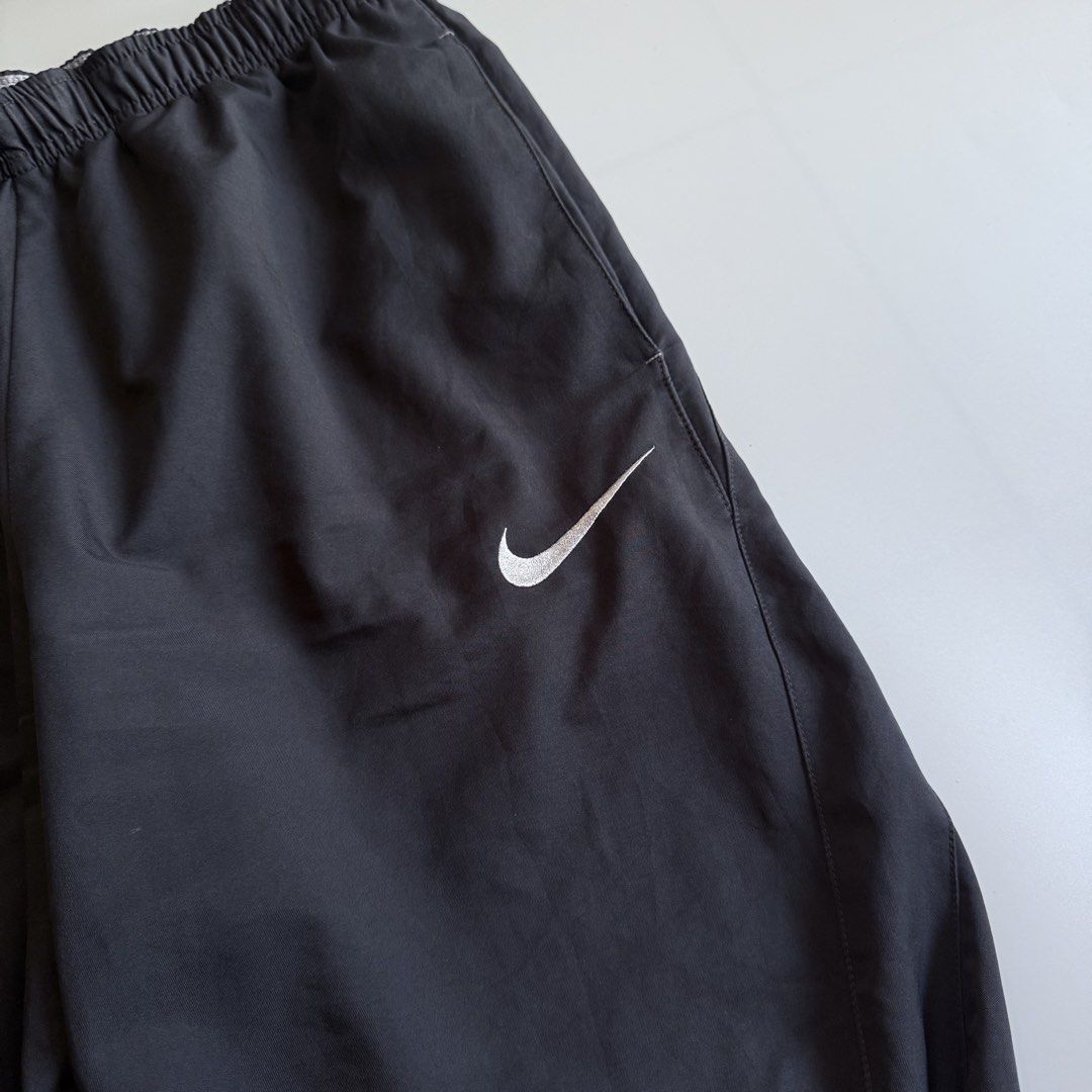 Nike Black Track Pants Size XL (Category: Joggers) located in Benito Soliven. Submitted by markedasdifferent (Listing ID 1469250125, Image 3). Description: NIKE TRACKPANTS 32-36 up 39L 13Thigh 8.5Hem CR AND CONDI: 8.5 SIGN OF USE.