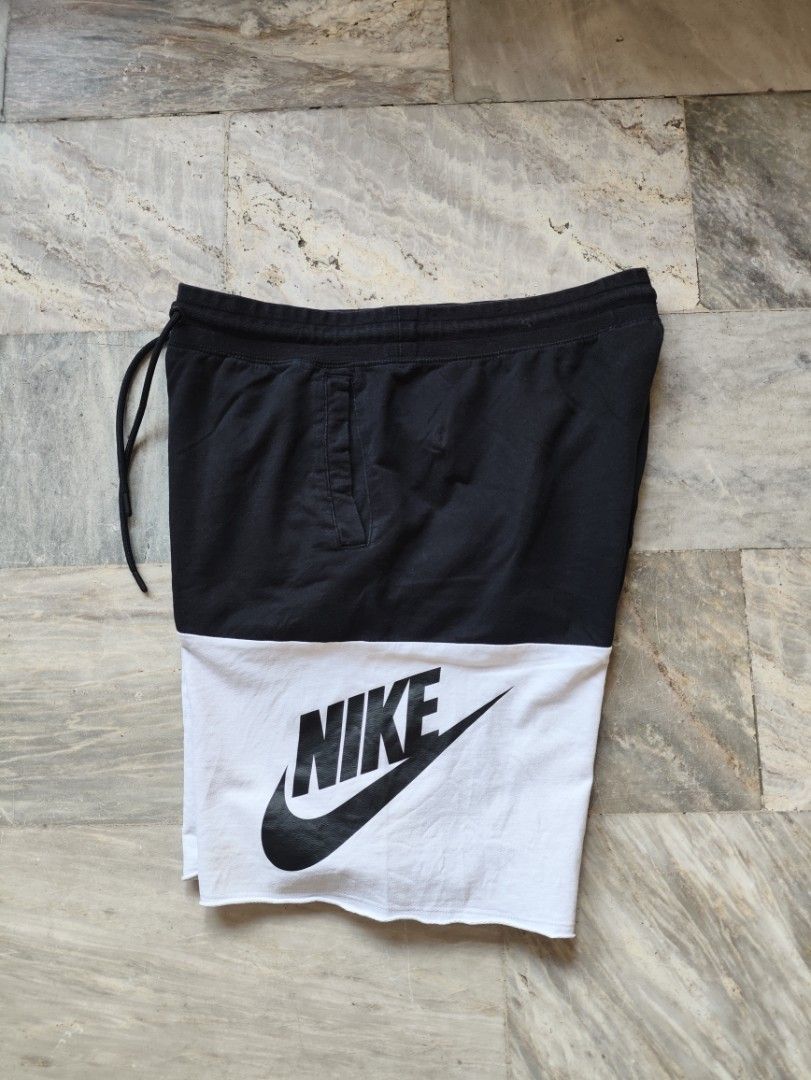 Nike Black White Colorblock Drawstring Shorts XL (Category: Shorts) located in Manila. Submitted by glenndejes07057 (Listing ID 1469300883, Image 1). Description: - Brand: Nike - Size: XL (refer to tag for exact measurements) - Color: Black and white with bold logo - Material: Comfortable cotton and spandex blend with stretch - Features: Adjustable drawstring waist and convenient side pockets.