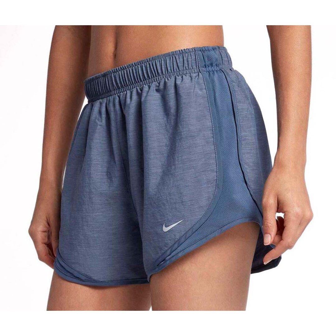 Nike Blue Athletic Running Shorts (Category: Shorts) located in Ajuy. Submitted by galitsabarat (Listing ID 1469337624, Image 2). Description: GOOD AS NEW CONDITION NO ISSUES - Brand: Nike - Color: Blue with a stylish heathered finish - Material: Lightweight and breathable - Waistband: Elastic with adjustable drawstring - Design: Curved hem with side slits for maximum mobility - Comfort: Built-in inner lining for extra coverage - Details: Small w