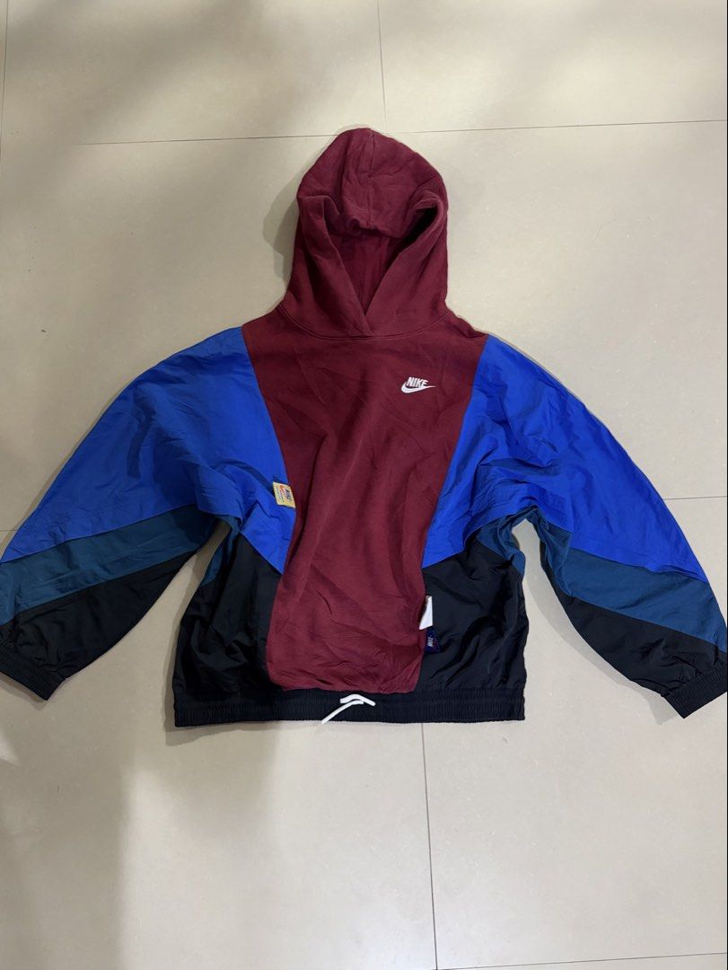 Nike Colorblock Hoodie Jacket (Category: Coats, Jackets and Outerwear) located in Manila. Submitted by zna_onlineshop (Listing ID 1469235275, Image 1). Description: - Brand: Nike - Style: Colorblock hoodie (maroon, blue, teal, black) - Size: Medium - Features: Embroidered chest logo, warm fleece lining, smooth nylon sleeves/lower panels, white drawstring hem - Origin: Made in Vietnam - Perfect for daily casual wear.