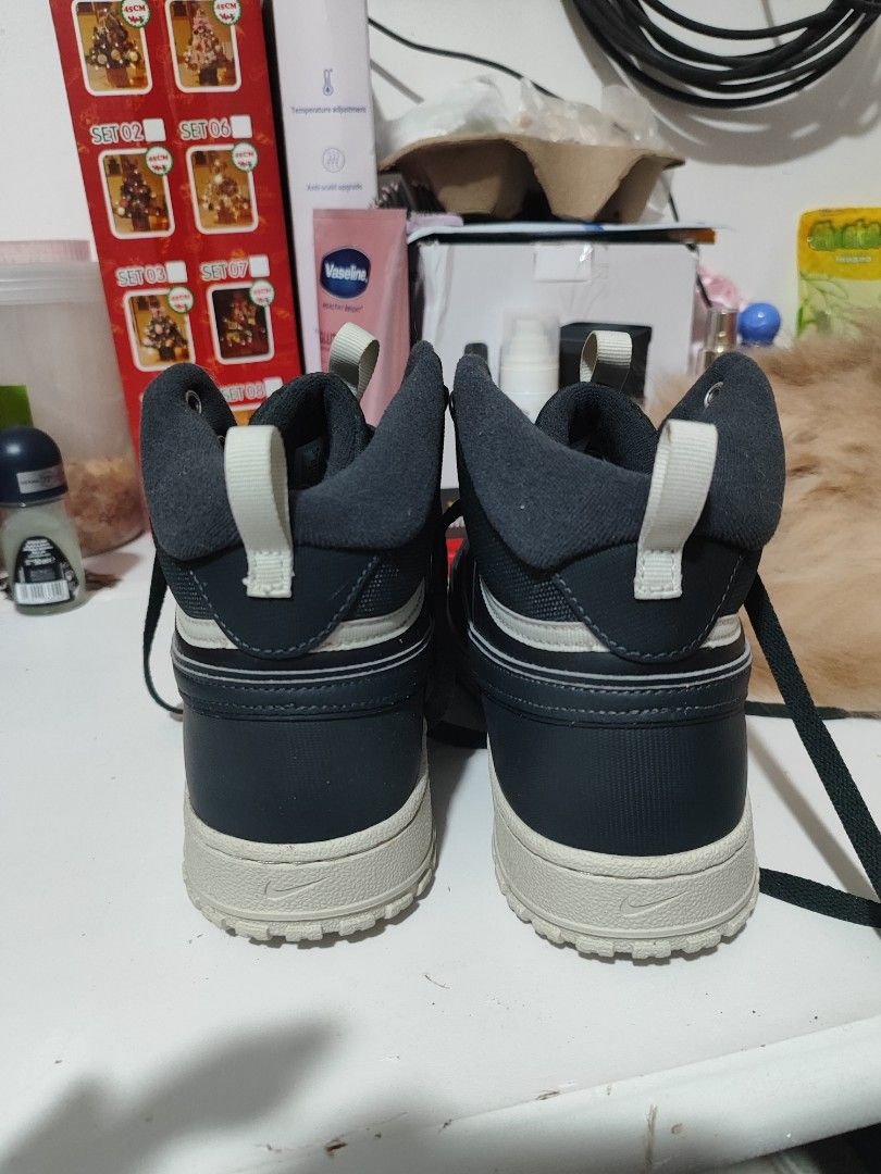 Nike court vision mid size 9 (Category: Sneakers) located in Tuguegarao City. Submitted by johnpetera0818 (Listing ID 1469346837, Image 3). Description: - Brand/Model: Nike High Top Sneakers - Color: Dark Grey - Size: US 9 / UK 8 / EUR 42.5 - Condition: Clean soles with zero wear, laces included - Features: Durable perforated toe box, sturdy rubber soles with great traction - Comfort: Padded collars for extra ankle support and convenient back pul