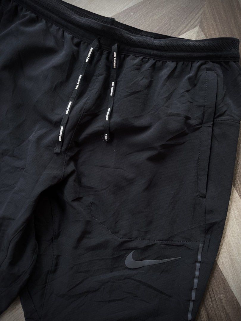 Nike Dri-FIT Running Track Pants (Category: Activewear) located in Pagadian. Submitted by thrift.wrld (Listing ID 1469261647, Image 3). Description: Nike Dri-FIT Running Track Pants Dimensions: • Waist: 29 - 32 • Length: 35 Drop Prices: • Mine: 800 + ₱9O shipping fee (sf) Details: • 1O/1O Color rate • Minimal Loose stitch sa Hem, As new condition with zero flaws • Need wash.