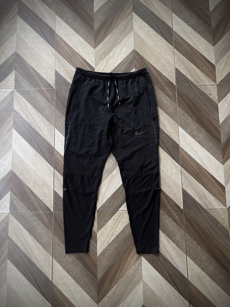 Nike Dri-FIT Running Track Pants (Category: Activewear) located in Pagadian. Submitted by thrift.wrld (Listing ID 1469261647, Image 2). Description: Nike Dri-FIT Running Track Pants Dimensions: • Waist: 29 - 32 • Length: 35 Drop Prices: • Mine: 800 + ₱9O shipping fee (sf) Details: • 1O/1O Color rate • Minimal Loose stitch sa Hem, As new condition with zero flaws • Need wash.