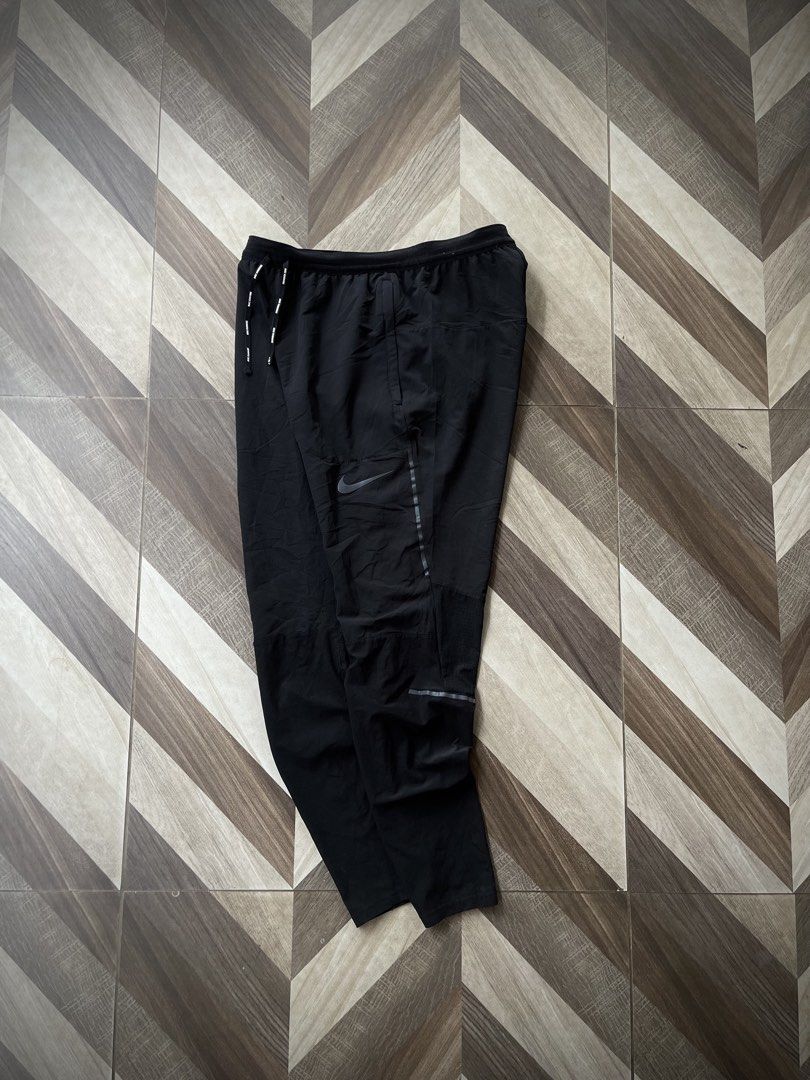 Nike Dri-FIT Running Track Pants (Category: Activewear) located in Pagadian. Submitted by thrift.wrld (Listing ID 1469261647, Image 1). Description: Nike Dri-FIT Running Track Pants Dimensions: • Waist: 29 - 32 • Length: 35 Drop Prices: • Mine: 800 + ₱9O shipping fee (sf) Details: • 1O/1O Color rate • Minimal Loose stitch sa Hem, As new condition with zero flaws • Need wash.