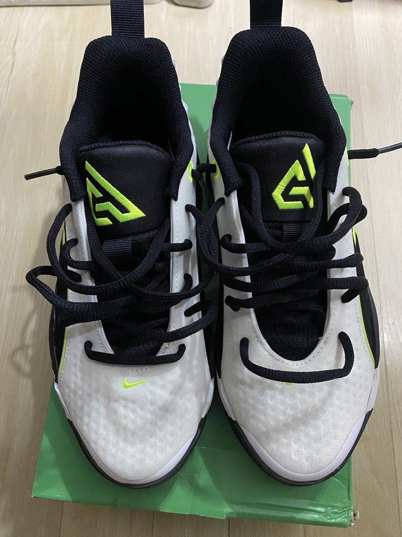 Nike Giannis Immortality 5 EP White Volt Black (Category: Sneakers) located in Makati City. Submitted by roangawat (Listing ID 1469199324, Image 1). Description: - Brand: Nike Giannis Immortality 5 EP - Colorway: White, Volt, and Black with neon green accents - Size: US 6 / UK 5.5 / EUR 38.5 / CM 24 - Condition: Clean uppers, minimal wear on treads, excellent grip - Inclusions: Original green Giannis box included - Features: Signature Giannis bra