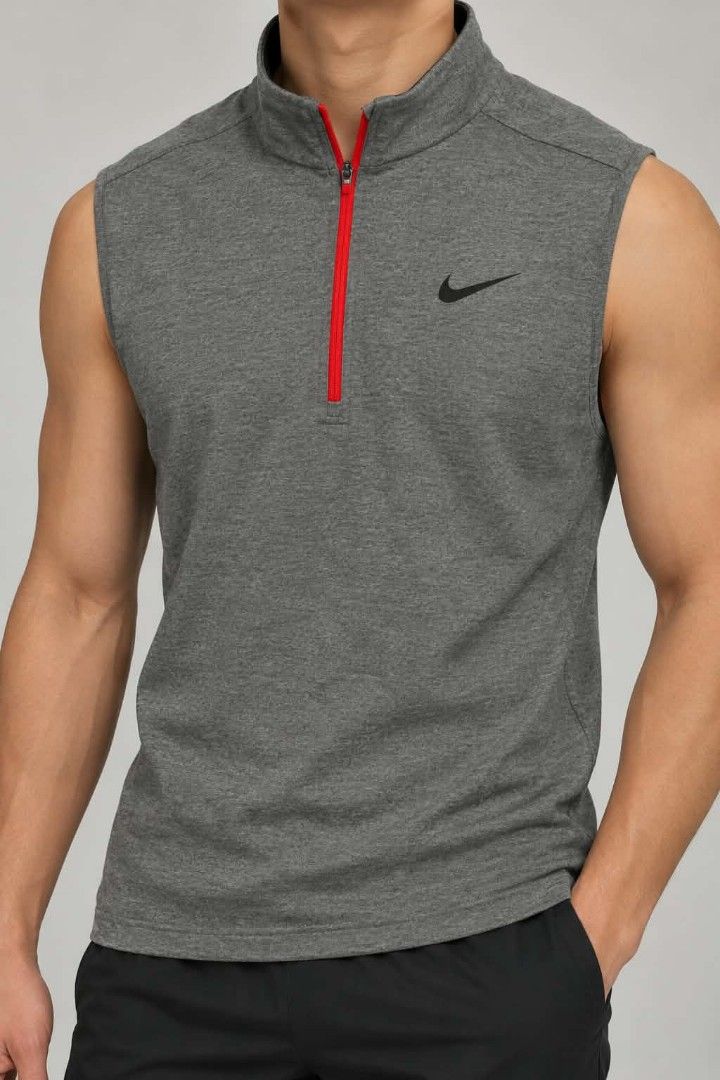 NIKE GRAY GOLF COATS (Category: Sleeveless) located in Caloocan City. Submitted by oldmoneyoutfit123 (Listing ID 1469310827, Image 1). Description: - Brand: Nike - Size: L - Color: Gray with red interior lining and red half-zip - Design: Sleeveless, mock neck, embroidered black Nike Swoosh on left chest - Material: Stretchy, comfortable ribbed knit - Condition: Excellent pre-loved condition - Perfect for activewear or casual layering.
