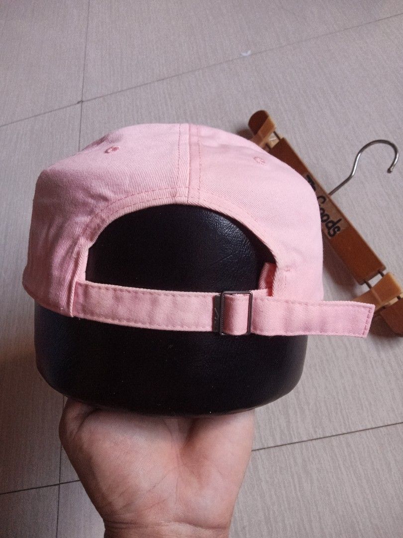 Nike Heritage86 Pink Cap (Category: Activewear) located in Tanay. Submitted by jrgoods (Listing ID 1469337567, Image 3). Description: - Authentic Nike Heritage86 cap in a cute pastel pink shade Nlke heritage cap(unisex) Osfa Excellent to new condition 380+ship Tanay Rizal location Shipping Nationwide - Features a chic white cursive Nike logo embroidered on the front - Classic six-panel design with embroidered eyelets for breathability - Adjustabl