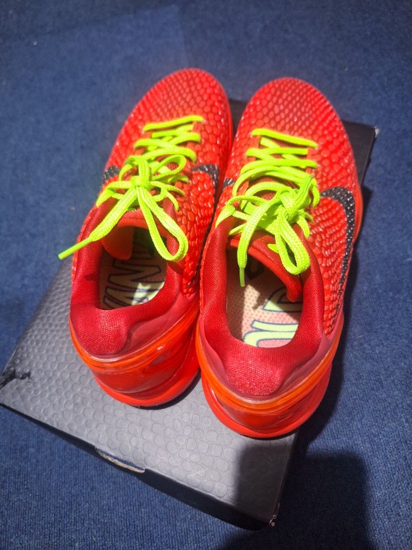 Nike Kobe 6 Protro Reverse Grinch GK batch (Category: Sneakers) located in Manila. Submitted by adolphreyes645 (Listing ID 1469286670, Image 2). Description: - Model: Bright red basketball sneakers with snakeskin texture - Accents: Bold lime green laces and dark grey Nike swoosh - Condition: Clean soles, crisp laces, excellent overall condition - Packaging: Comes with original matching snake-textured shoe box - Versatility: Perfect for both baske