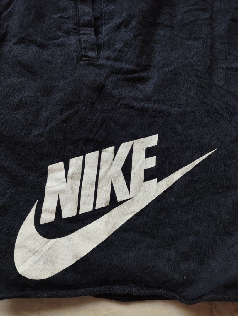 Nike Men's Black Shorts with White Logo (Category: Shorts) located in Manila. Submitted by glenndejes07057 (Listing ID 1469301143, Image 2). Description: - Authentic Nike shorts in classic black (Style code: 836278-010) - Size: Large - Bold white swoosh and logo printed on the left leg - Comfortable drawstring waistband with white cords - Convenient side pockets for daily essentials - Trendy raw edge hem at the bottom - Complete with material tag