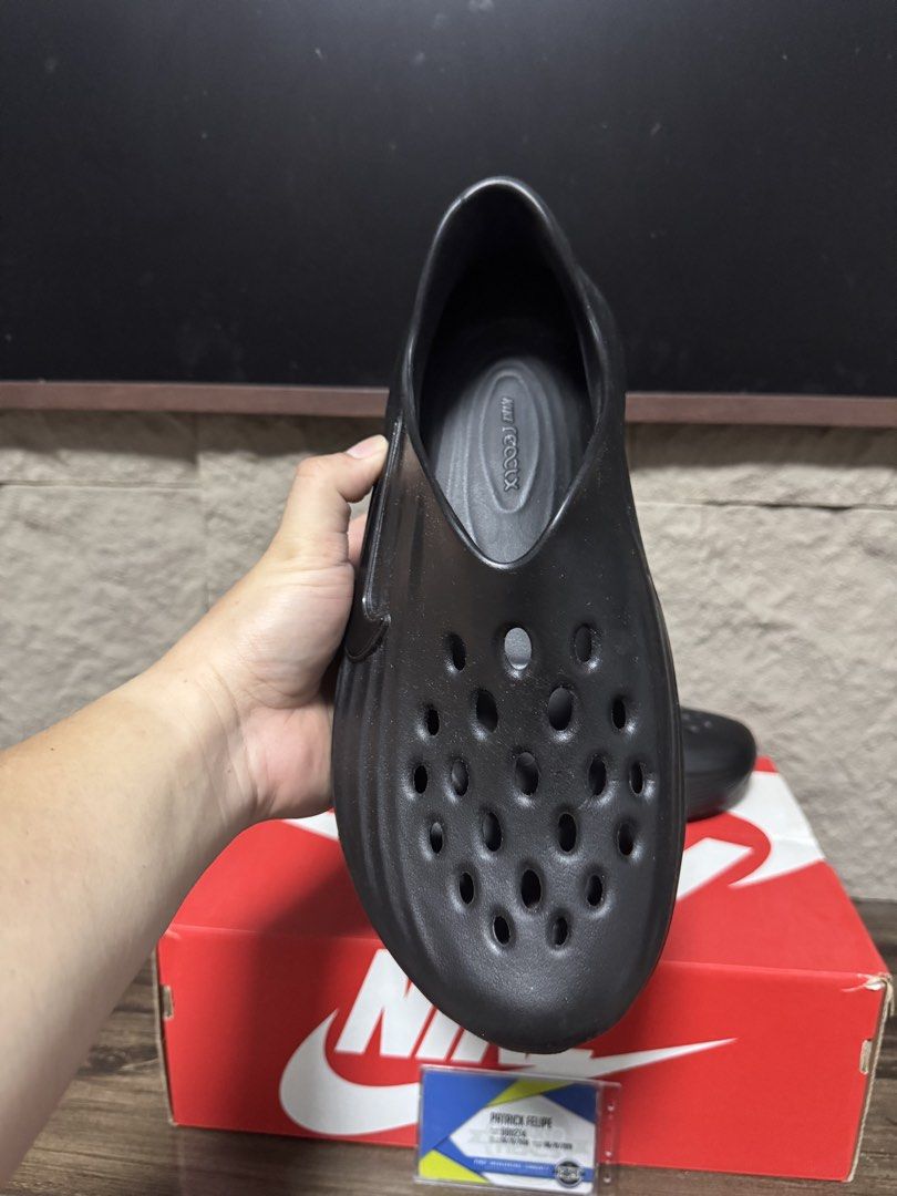 Nike rejuven8 Triple Black Slides (Category: Slippers & Slides) located in Caloocan City. Submitted by onetwelvetwelve (Listing ID 1469317363, Image 3). Description: - Model: Nike Calile Mule - Colorway: Triple Black - Material: Super lightweight foam - Design: Slip-on style with curved ribbed textures on the sides and ventilation holes on the toe box for breathability - Branding: Nike Swoosh stamped on the lateral side - Perfect for daily casual