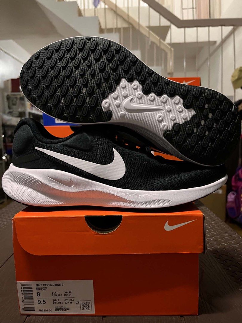 Nike Revolution 7 Black White Men US 8 / 9.5 (Category: Sneakers) located in Caloocan City. Submitted by sarahastrid (Listing ID 1469285073, Image 1). Description: - Item: Nike Revolution 7 Running Shoes - Color: Black upper with white swoosh and white sole - Condition: Brand new, never worn, pristine condition - Size: US Men 8 / US Women 9.5 / UK 7 / EUR 41 / 26 cm - Inclusions: Complete with original orange Nike shoebox - Perfect for daily runs