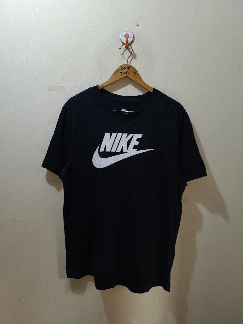 Nike Shirt (Category: Tshirts & Polo Shirts ) located in Makati City. Submitted by ivsseyow03 (Listing ID 1469278933, Image 1). Description: Black Nike t-shirt with large white logo print on the chest. Crew neck style, short sleeves. Size XL on the inner tag. Classic everyday tee, easy to pair with anything. Clean condition overall..