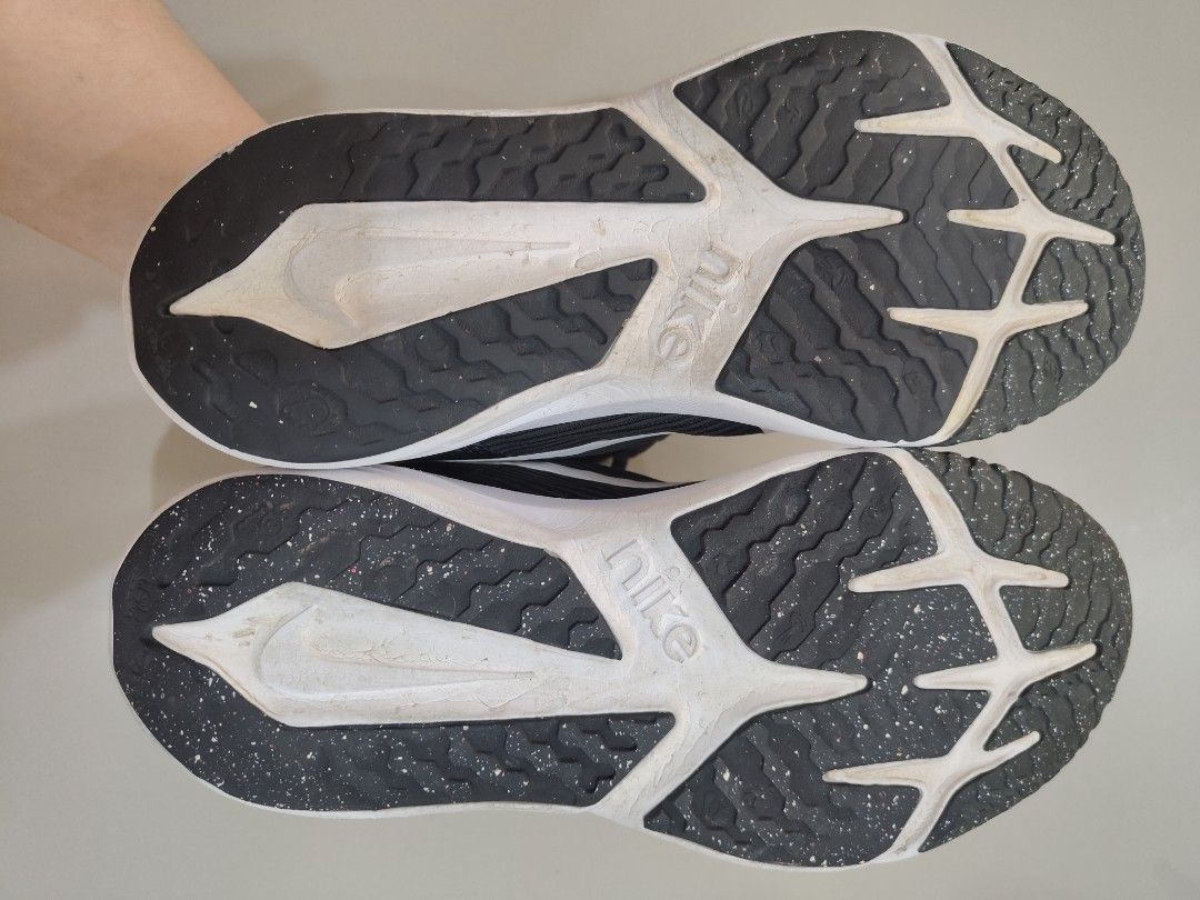 Nike Star Runner Black White Running Shoes (Category: Sneakers) located in Calamba. Submitted by an_ne0501 (Listing ID 1469210321, Image 2). Description: - Brand/Model: Nike Star Runner Sneakers - Color: Classic Black and White - Material: Breathable mesh upper with secure lace-up closure - Comfort: Soft cushioned white foam midsole - Traction: Durable black rubber outsole - Condition: Minor wear on white sole sides and slight dirt on treads (sti