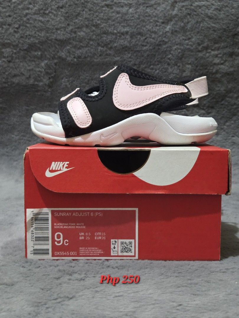 Nike Sunray Adjust 6 (Category: Babies & Kids Fashion) located in Bulacan. Submitted by gtrvddg (Listing ID 1469224541, Image 1). Description: - Brand: Nike Sunray Adjust 6 (Kids) - Color: Black strap with pink foam accents and white sole - Size: US 9C / UK 8.5 / CM 15 / EUR 26 - Condition: Clean, never worn out - Inclusions: Comes with original red Nike box.