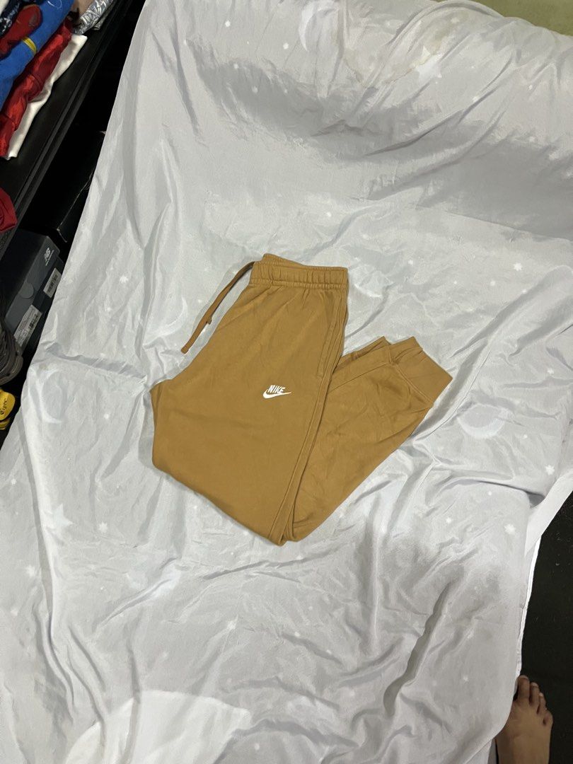 Nike Sweatpants Mustard Yellow (Category: Joggers) located in Muntinlupa City. Submitted by ninenine.collective (Listing ID 1469323322, Image 2). Description: waist - 30 to 38 length - 37.5.