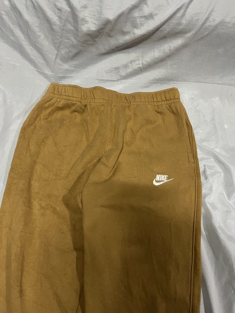 Nike Sweatpants Mustard Yellow (Category: Joggers) located in Muntinlupa City. Submitted by ninenine.collective (Listing ID 1469323322, Image 3). Description: waist - 30 to 38 length - 37.5.