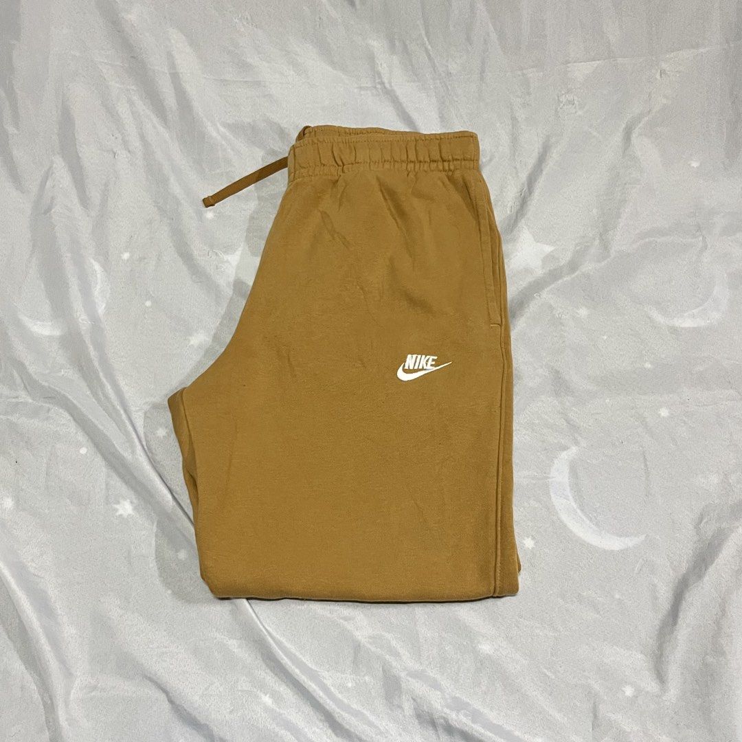 Nike Sweatpants Mustard Yellow (Category: Joggers) located in Muntinlupa City. Submitted by ninenine.collective (Listing ID 1469323322, Image 1). Description: waist - 30 to 38 length - 37.5.