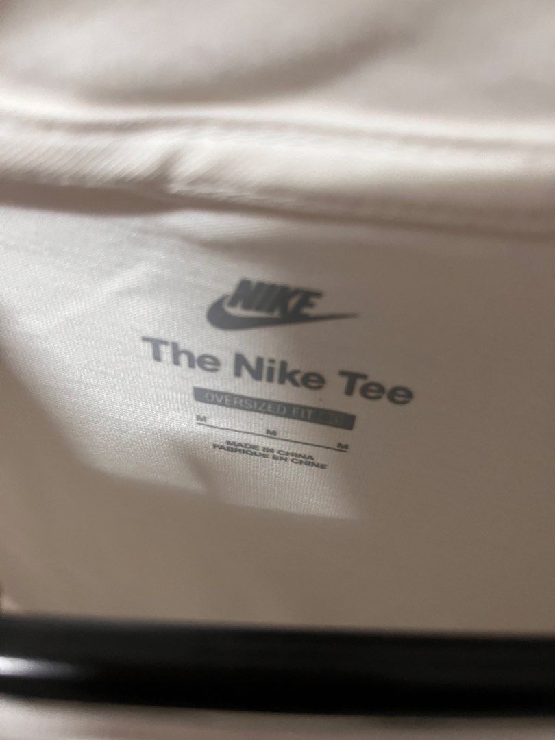 Nike The Nike Tee Oversized Rhinestone Just Do It (Category: Shirts) located in Meycauayan. Submitted by ranastridran (Listing ID 1469262567, Image 2). Description: - Brand: Nike - Color: White - Fit: Oversized - Design: Sparkling rhinestone 'Just Do It' graphic and swoosh logo - Material: 100% cotton - Condition: Clean, brand new with tags intact - Origin: Made in China.
