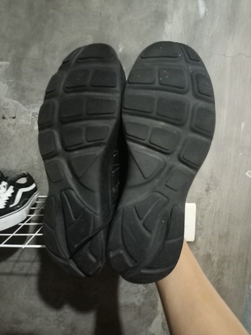 Nike Triple Black Running Shoes (Category: Sneakers) located in Mabalacat. Submitted by hasashoe (Listing ID 1469179974, Image 2). Description: - Brand/Model: Nike Running Shoes - Color: All Black - Size: US 8 - Material: Lightweight mesh upper with rubber soles and matching laces - Condition: Worn a few times, soles still have plenty of grip, clean overall - Best for: Workouts or casual everyday wear.