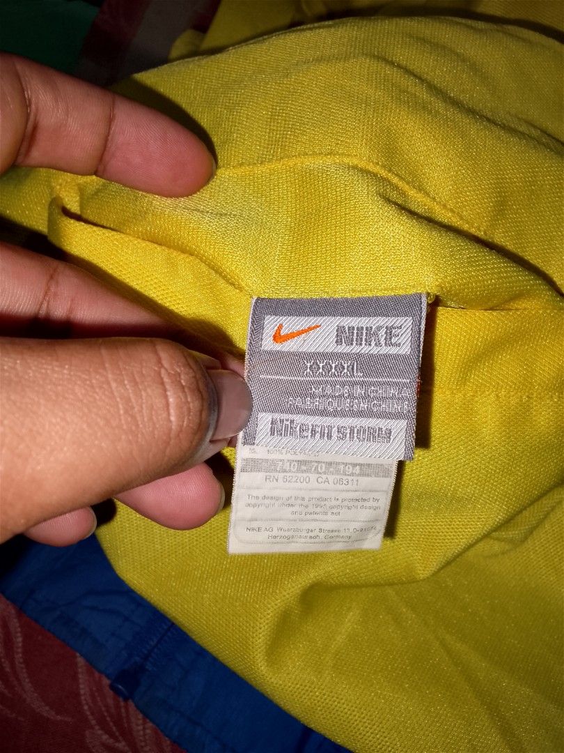 Vintage Nike Track Jacket (Category: Coats, Jackets and Outerwear) located in Dasmarinas. Submitted by alexander24 (Listing ID 1469313526, Image 3). Description: Nike Reversible Jacket Size: XL fitting Dimes: W23.5 x L28 Condition: Excellent Color rate: 9.8/10 No issue Reverse Condition: Excellent Color rate: 9.8/10 Issue: Scratch.