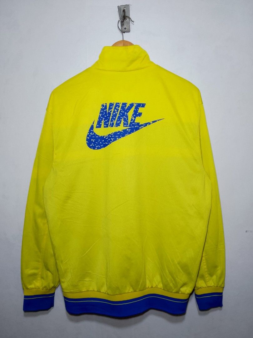 Vintage Nike Track Jacket (Category: Coats, Jackets and Outerwear) located in Dasmarinas. Submitted by alexander24 (Listing ID 1469313526, Image 2). Description: Nike Reversible Jacket Size: XL fitting Dimes: W23.5 x L28 Condition: Excellent Color rate: 9.8/10 No issue Reverse Condition: Excellent Color rate: 9.8/10 Issue: Scratch.