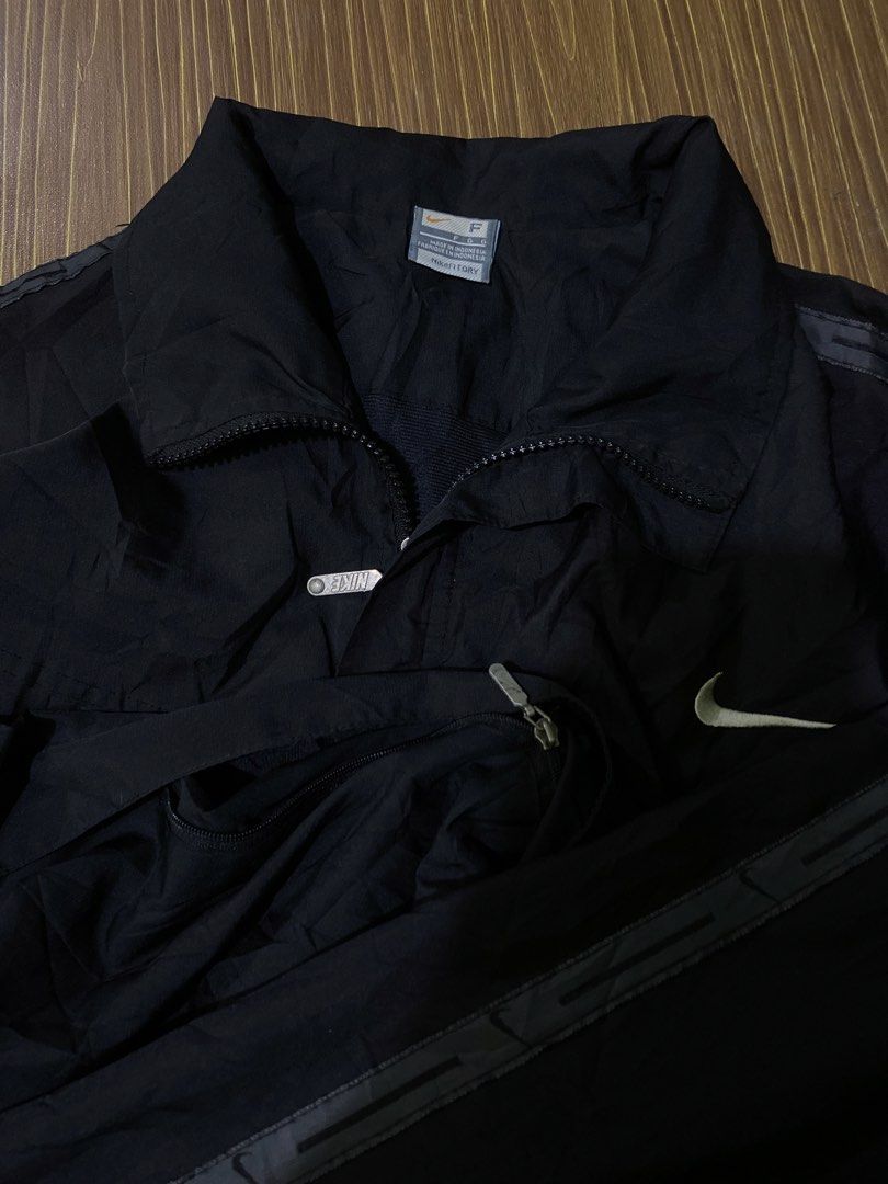 Nike Y2k/Vintage Nylon Windbreaker Jacket (Category: Coats, Jackets and Outerwear) located in Bansalan. Submitted by cjs_thrift (Listing ID 1469259963, Image 3). Description: - LARGE - DIMENSIONS: 23 by 28 - COLOR RATE:9.8/10 - VERY GOOD CONDITION - NO ISSUE - COMPLETE TAGS - NEED WASH.