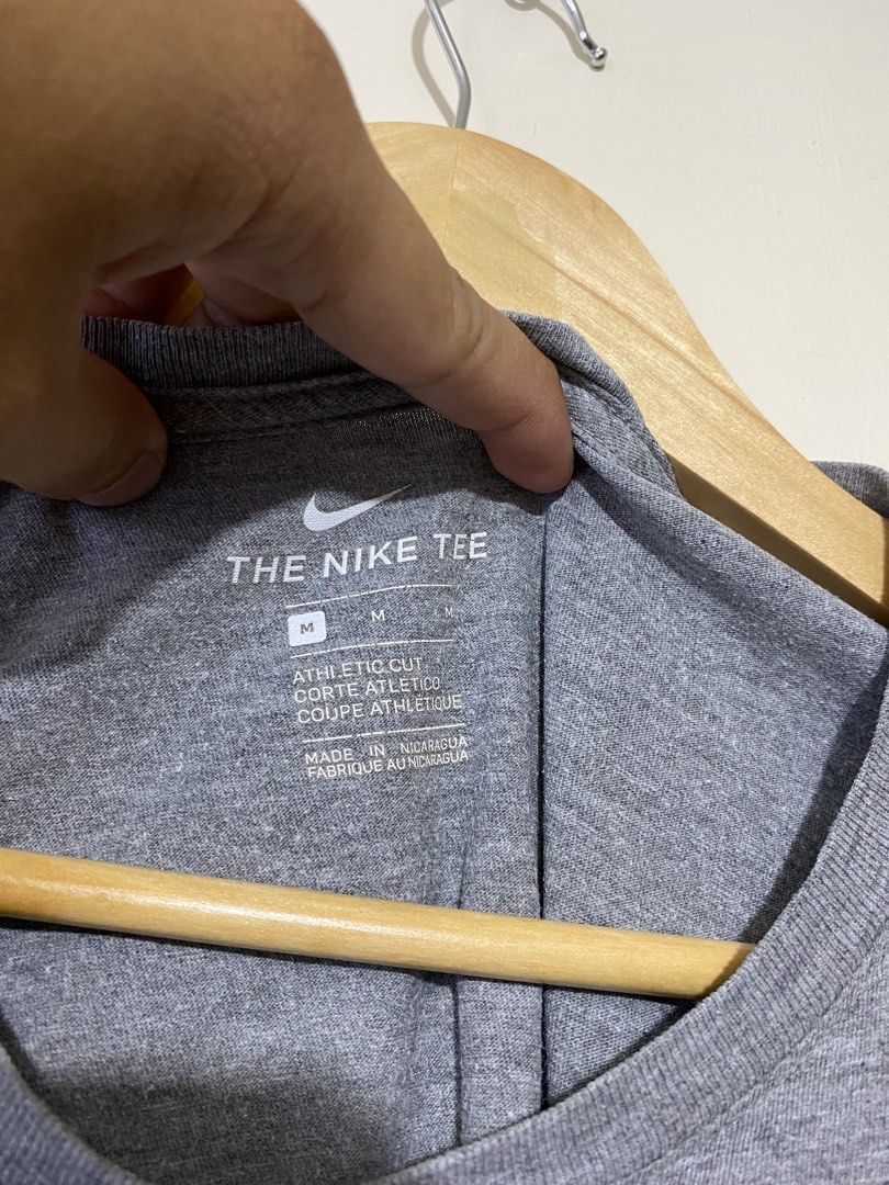 NIKE,T-shirt (Category: Tshirts & Polo Shirts ) located in Cavite. Submitted by jc_thrift95 (Listing ID 1469316500, Image 3). Description: - gray Nike “Games End Training Doesn’t” short-sleeve athletic t-shirt. - Made in Nicaragua - L- 28 inch - W- 21 inch - Color rate 8/10 - See picture details for dimes..