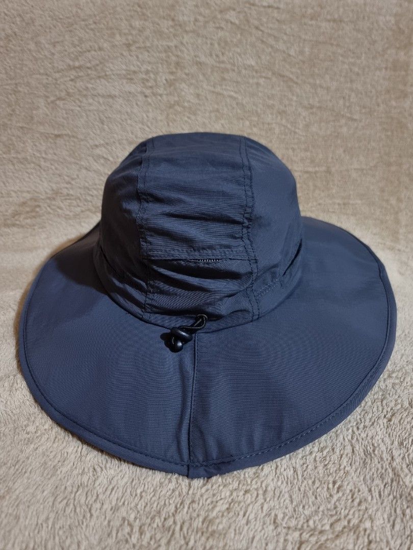 NIKKO Outdoor Bucket Hat (Category: Hats & Beanies) located in Imus. Submitted by aim_for_less (Listing ID 1469306316, Image 3). Description: NIKKO Outdoor Bucket Hat - Brand: NIKKO - SIZE: 60CM - Color: Dark grey - Wide brim for maximum sun protection - Adjustable black chin cord with toggle for a secure fit - Lightweight material with breathable inner mesh lining - Features the brand logo printed on the side - Ideal for hiking, fishing, gardeni