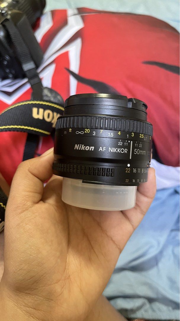 Nikon 50mm lens (Category: Cameras) located in Manila. Submitted by queene_28 (Listing ID 1469357423, Image 3). Description: Please buy this, sayang at hindi ko rin magagamit :( like new ..