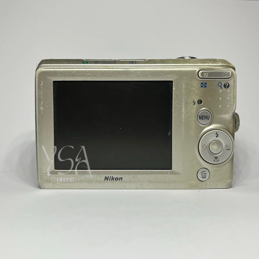 NIKON COOLPIX L19 Digital Camera Digicam (Category: Cameras) located in Manila. Submitted by ysabelaaa__ (Listing ID 1469300144, Image 2). Description: NIKON COOLPIX L19 ⭐️ #preowned ₱1700 FIXED + SF issues: battery door needs to be taped & mild dusts on full zoom ✮ 8.0 mp, 3.6x optical zoom ✮ 8/10 body cosmetics ✮ fully functional - zoom, flash, and all buttons working ✮ uses 2AA batteries; not included inclusions: unit, 2gb sd card, and camera 