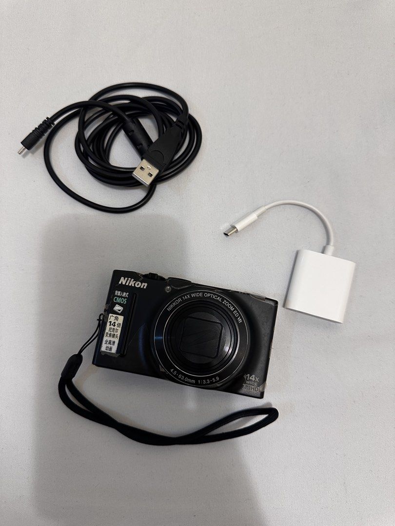 Nikon Coolpix S8200 Digital Camera with Accessories (Category: Cameras) located in Manila. Submitted by stuffyby.andrea (Listing ID 1469244805, Image 1). Description: - Model: Nikon Coolpix S8200 Compact Digital Camera - Color: Sleek Black - Lens: 14x wide optical zoom ED VR lens (4.5-63.0mm f/3.3-5.9) - Flash: Integrated pop-up flash unit - Condition: Fully working, powers on, and displays menus on the rear LCD screen - Included Accessories: USB