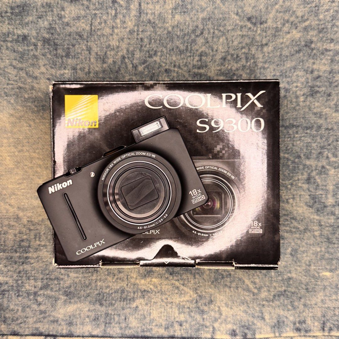 Nikon Coolpix S9300 (Category: Cameras) located in Adams. Submitted by jeysiiidelacruz (Listing ID 1469227733, Image 1). Description: Nikon Coolpix S9300 🖤 superb outputs!!! 14,999pesos only! plus shipping fee! FIXED PRICE! - 16 megapixels - BSI- CMOS sensor - 18x optical zoom, good for concerts - pop- up flash - lens VR - 1080p 30fps video resolution FULLY FUNCTIONAL!! ✨ - zoom, pop- up flash, all buttons working! 9/10 Body cosmetics! minimal s