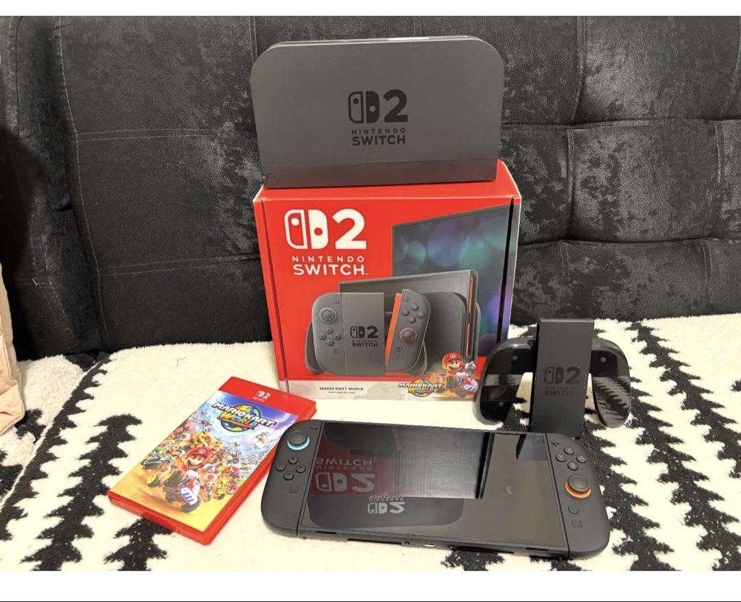 Nintendo Switch 2 Console Bundle with Mario Kart World (Category: Nintendo) located in Manila. Submitted by swiftmountain.988907 (Listing ID 1469187958, Image 2). Description: NINTENDO SWITCH 2 + MARIO KART BUNDLE ₱30k - negotiable Inclusions: - Nintendo Switch 2 - Mario Kart Game - Box & Charger - Protective Case Good as new. No issues. No scratches. Rfs: Bought PS5.