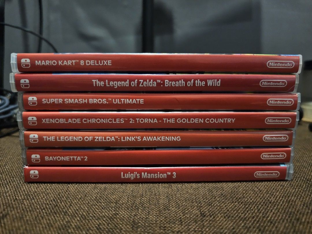 Nintendo Switch Games Bundle - Mario Kart, Zelda & More (Category: Nintendo) located in Paranaque City. Submitted by thenextnumber7 (Listing ID 1469309113, Image 1). Description: - Nintendo Switch games available as a bundle or individually - Titles included: Mario Kart 8 Deluxe, The Legend of Zelda: Breath of the Wild, Super Smash Bros Ultimate, Xenoblade Chronicles 2: Torna The Golden Country, The Legend of Zelda: Link's Awakening, Bayonetta 2,