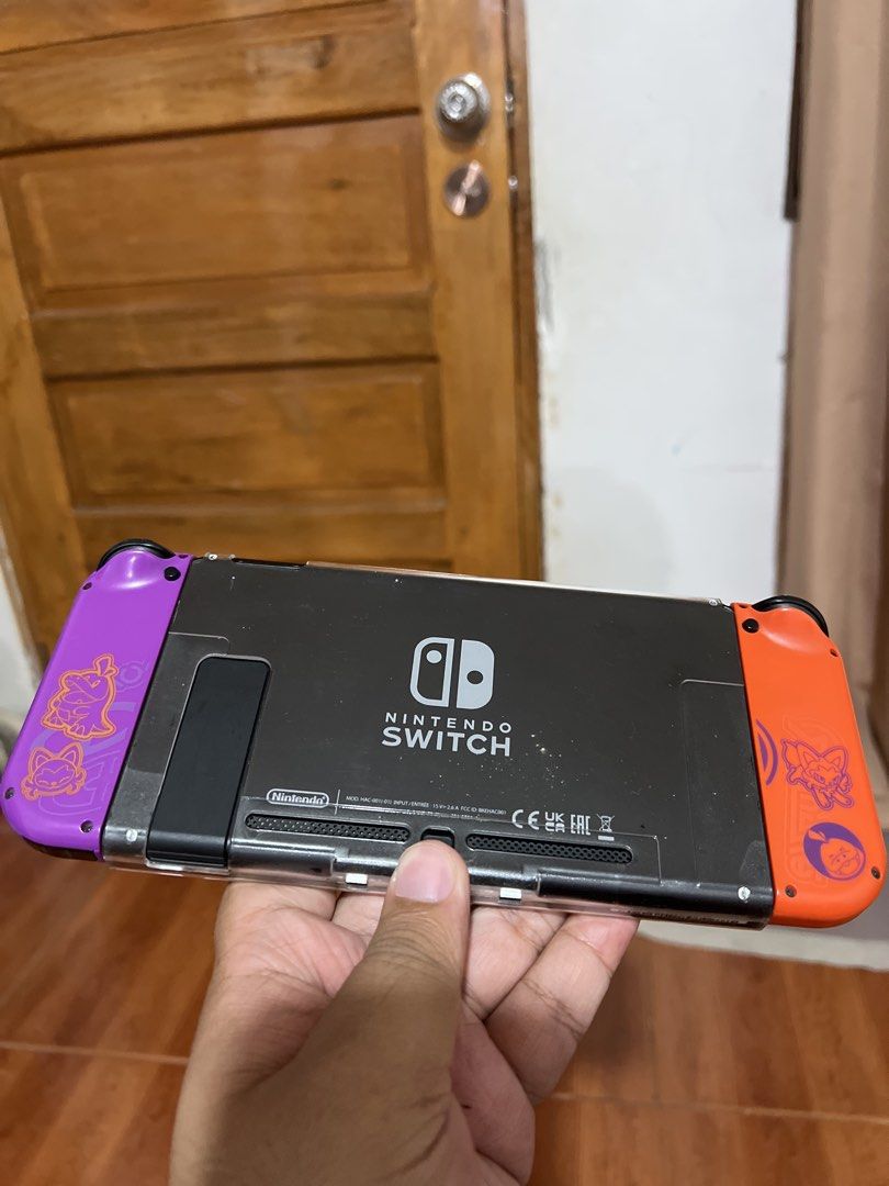 Nintendo Switch V2 with Games (Category: Nintendo) located in Agdangan. Submitted by yannarish (Listing ID 1469309366, Image 3). Description: Nintendo Switch V2 with extra controller with dock charger with hdmi with controller dock with case NSO ACCOUNT WITH GAMES: - nba2k25 - hogwarts legacy - super smash bros ultimate - story of seasons friends of mineral town - monster hunter stories 2 - Demon Slayer - The Hinokami Chronicles 2 - Pokemon Legen