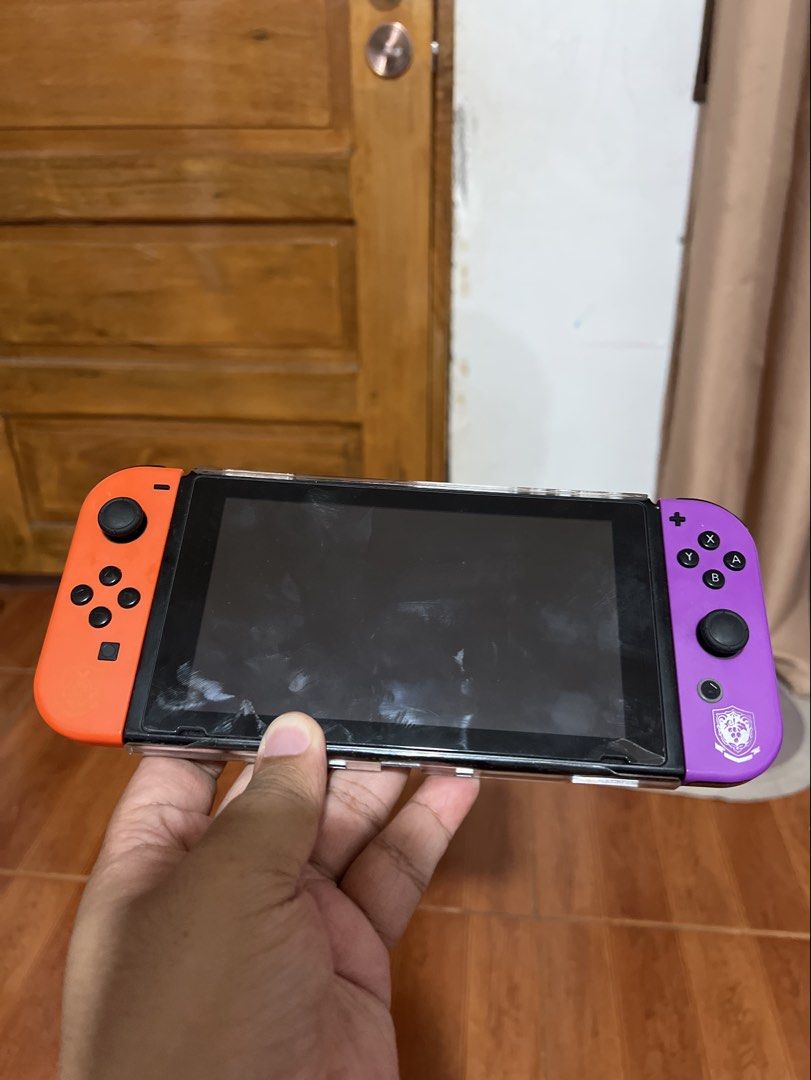Nintendo Switch V2 with Games (Category: Nintendo) located in Agdangan. Submitted by yannarish (Listing ID 1469309366, Image 2). Description: Nintendo Switch V2 with extra controller with dock charger with hdmi with controller dock with case NSO ACCOUNT WITH GAMES: - nba2k25 - hogwarts legacy - super smash bros ultimate - story of seasons friends of mineral town - monster hunter stories 2 - Demon Slayer - The Hinokami Chronicles 2 - Pokemon Legen