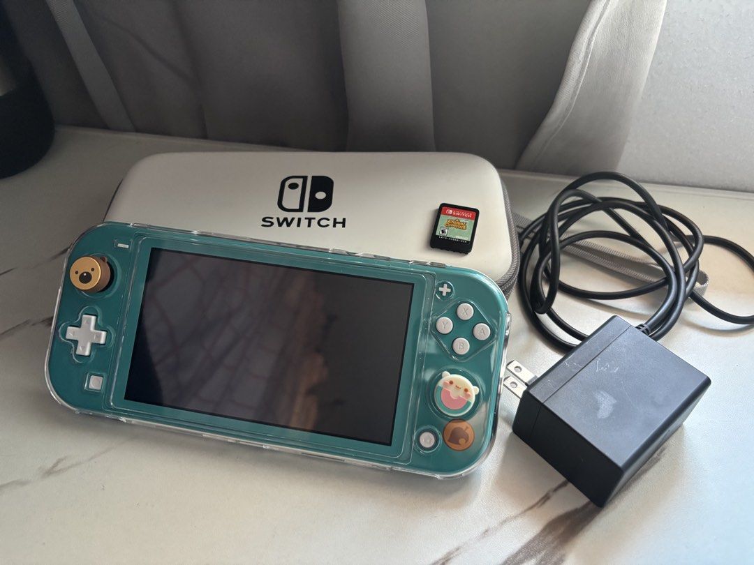 Nintendo Swith Lite - Animal Crossing edition (Category: Nintendo) located in Manila. Submitted by leetrisha_lion (Listing ID 1469219947, Image 1). Description: Nintendo Switch Lite. Animal Crossing Special Edition ( NON JAILBREAK ) Performance: 100% functional, smooth performance, never repaired. • Joy-Cons: No stick drift. • Buttons: All buttons are fully functional, highly responsive, and work perfectly. • Screen: Protected with a tempered gla