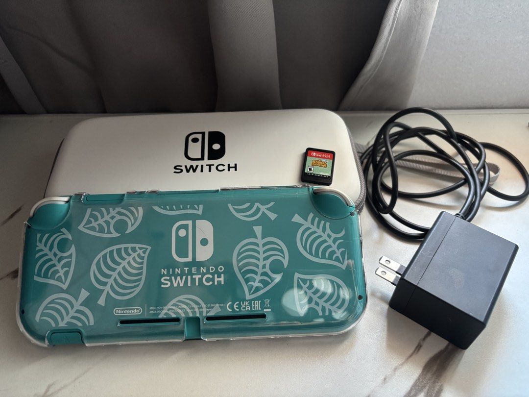 Nintendo Swith Lite - Animal Crossing edition (Category: Nintendo) located in Manila. Submitted by leetrisha_lion (Listing ID 1469219947, Image 2). Description: Nintendo Switch Lite. Animal Crossing Special Edition ( NON JAILBREAK ) Performance: 100% functional, smooth performance, never repaired. • Joy-Cons: No stick drift. • Buttons: All buttons are fully functional, highly responsive, and work perfectly. • Screen: Protected with a tempered gla