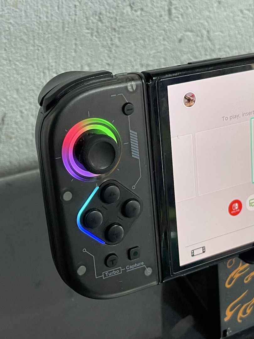 NYXI RGB Wireless Joy-Pad Controller for Nintendo Switch (Category: Controllers) located in Bacoor. Submitted by icarusjinzakk (Listing ID 1469197861, Image 2). Description: Nyxi Hyperion 2 Wireless Controller For switch Compatible to v1, v2 and oled for attachment (please check photos for sample on switch oled) Lite and switch 2 (wireless) RGB Lights (steady,breathing mode) Off mode Hall effect jostick Mechanical keys Controller and holder only 