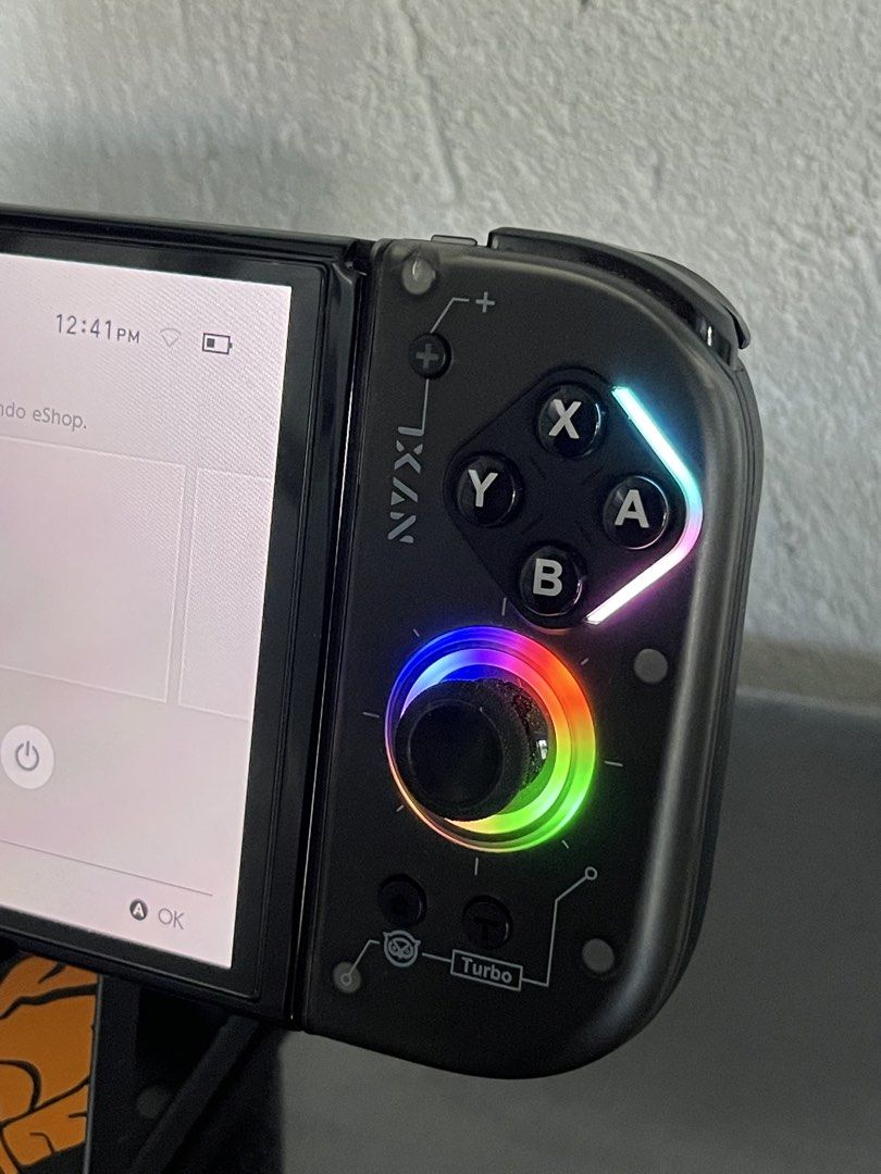 NYXI RGB Wireless Joy-Pad Controller for Nintendo Switch (Category: Controllers) located in Bacoor. Submitted by icarusjinzakk (Listing ID 1469197861, Image 3). Description: Nyxi Hyperion 2 Wireless Controller For switch Compatible to v1, v2 and oled for attachment (please check photos for sample on switch oled) Lite and switch 2 (wireless) RGB Lights (steady,breathing mode) Off mode Hall effect jostick Mechanical keys Controller and holder only 